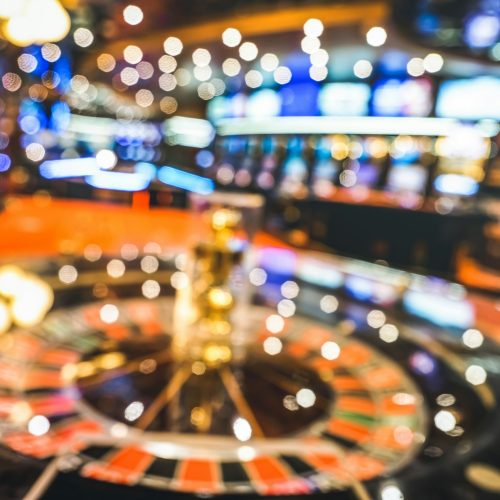 Blurred defocused background of roulette at casino saloon