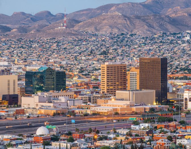 El Paso, Texas, USA  downtown city skyline at dusk with Juarez, Mexico in the distance.