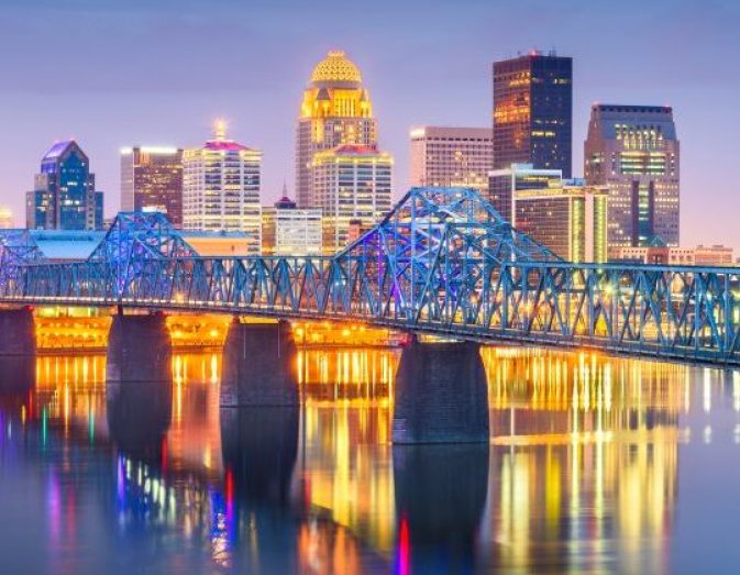 Louisville, Kentucky, USA downtown skyline on the Ohio River at